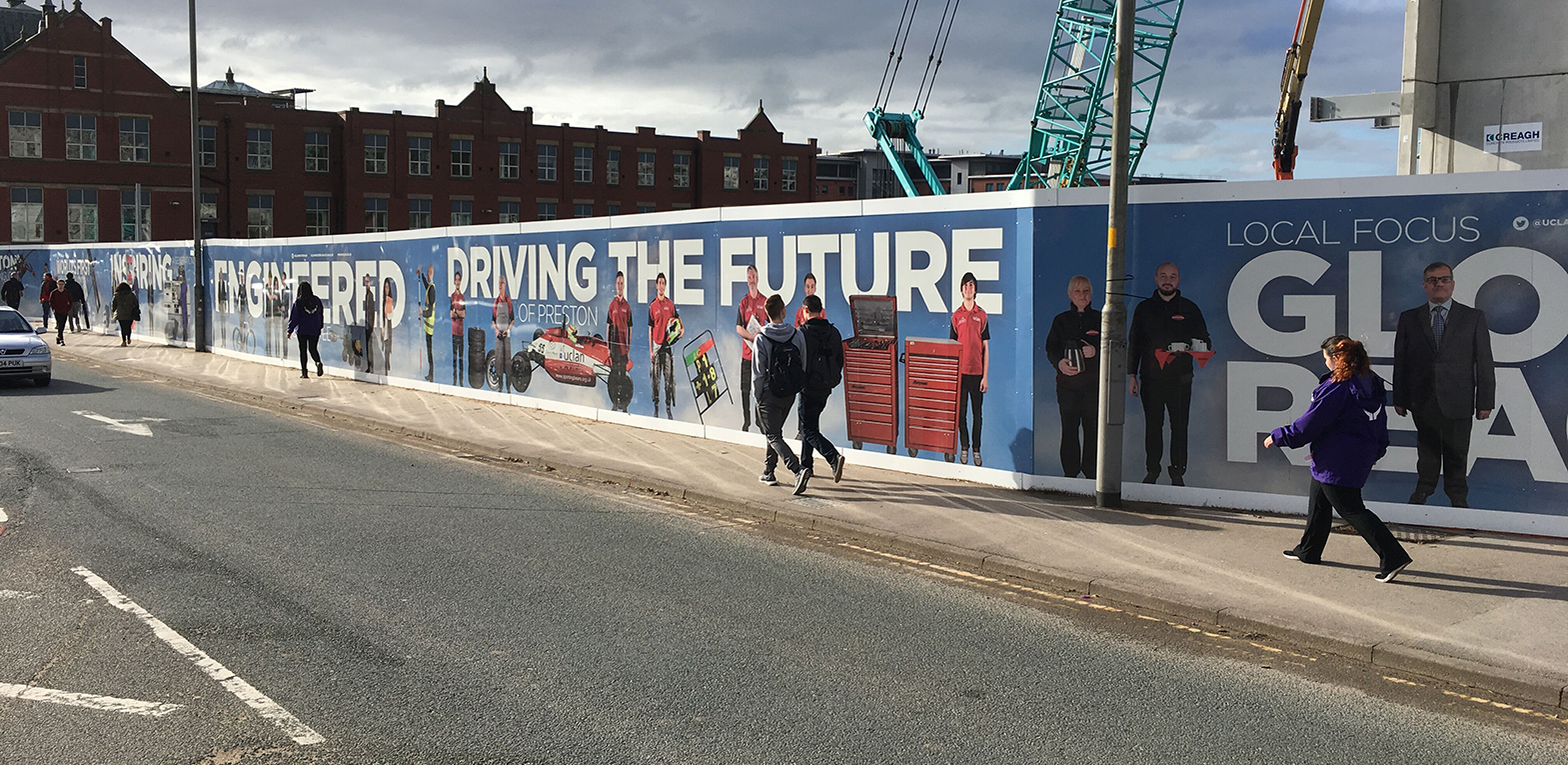 The hoardings around the construction site of UCLan's new EIC building.