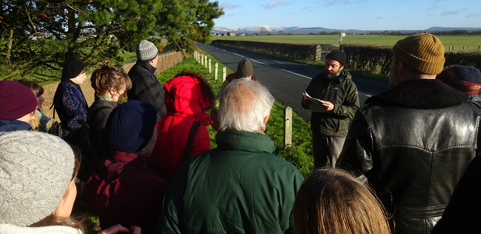 Ian and Ruth deliviering a talk to participants in the Precarious Landscape bus tour