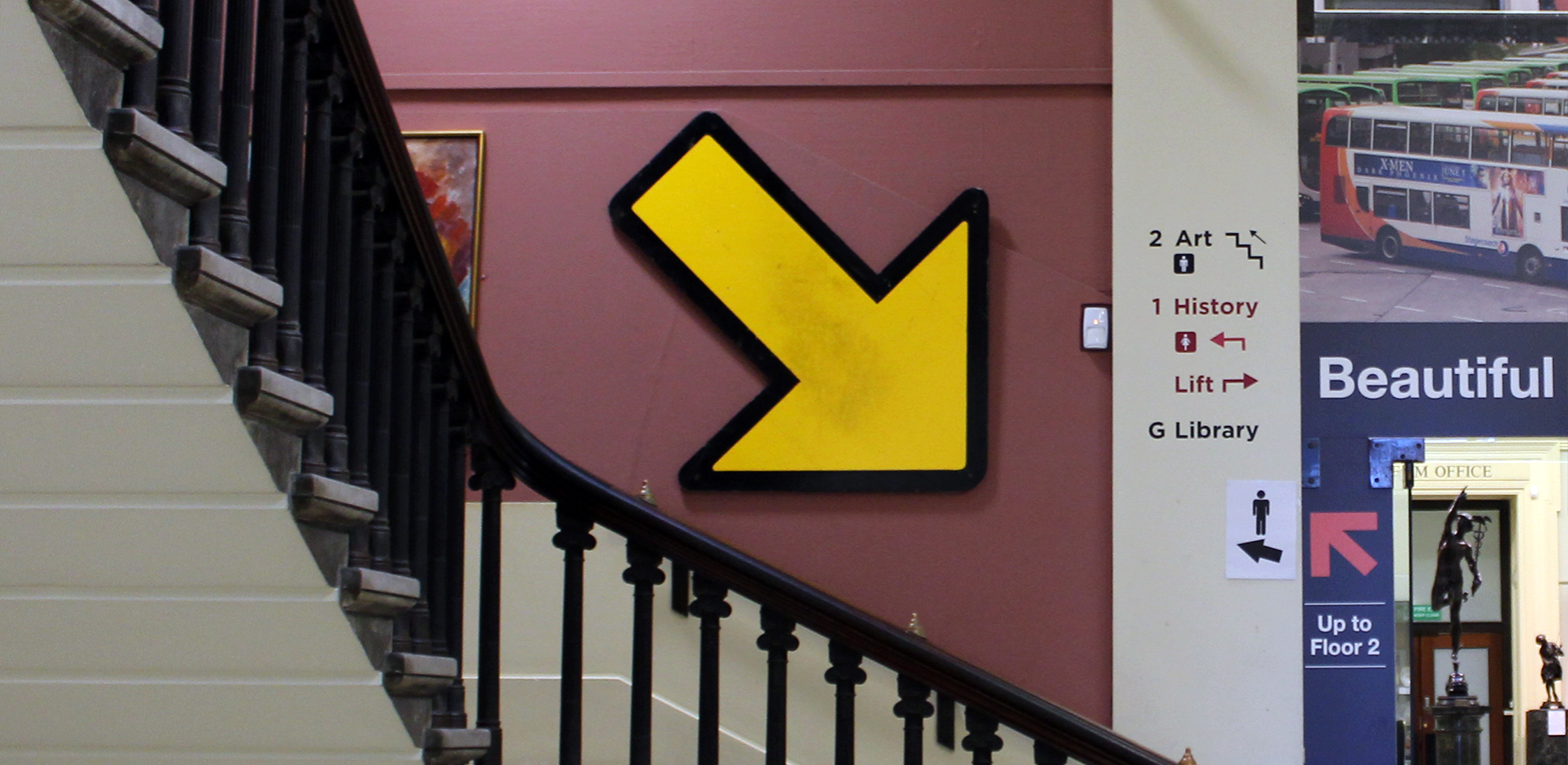 The exhibition in the Harris Museum. A directional arrow from the PBS car park in installed on one of the staircases at the Harris Museum.