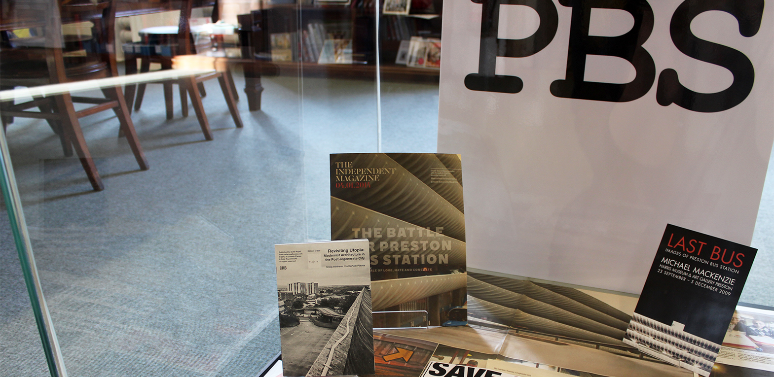 The exhibition in the Harris Museum. A display case with zines, publications and flyers about Preston Bus Station.