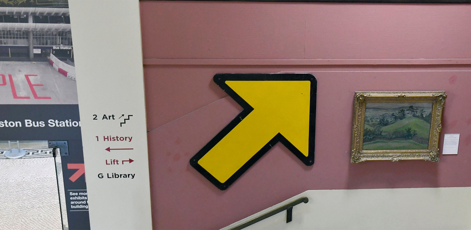 The exhibition in the Harris Museum. A directional arrow from the PBS car park in installed on one of the staircases at the Harris Museum.